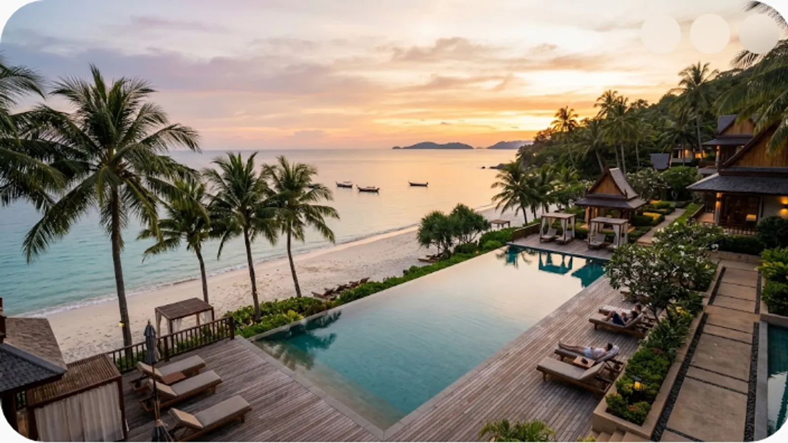 luxury beachfront resort with an infinity pool overlooking the ocean at sunset